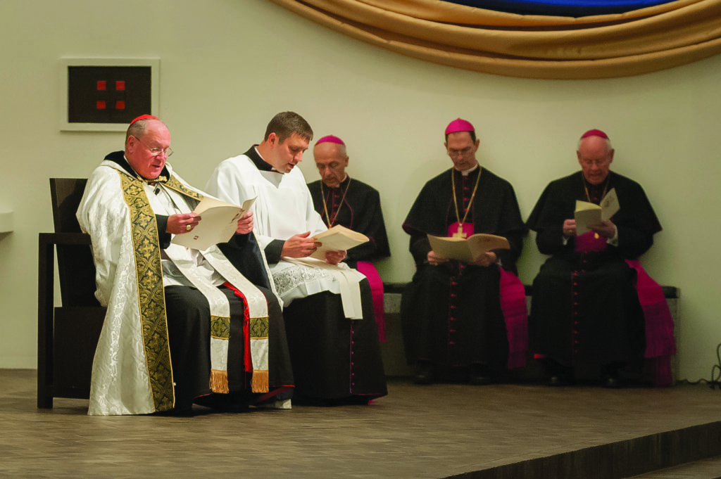 Cardinal Timothy Dolan prays Evening Prayer with all the religious of North Dakota, including, from left to right, Monsignor James Shea, president of the University of Mary; Bishop David Kagan, Bismarck; Bishop John Folda, Fargo; and Bishop Paul Zipfel, Bishop Emeritus of Bismarck. (Photo courtesy of University of Mary)