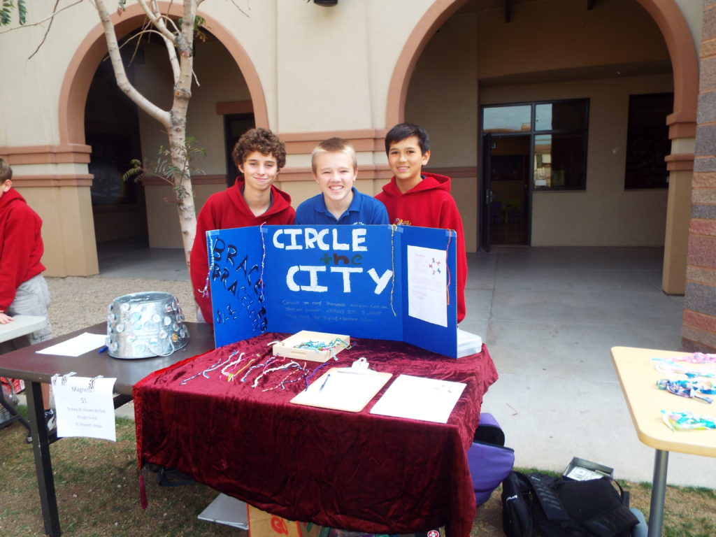 Seventh-graders sell bracelets to raise money for Circle the City, a medical respite facility for those in Maricopa County facing homelessness. (photo courtesy of St. Francis Xavier Catholic School)
