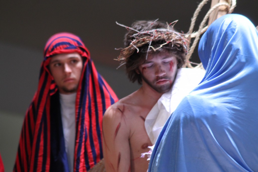 Chandler Stubbs and John Carnicle portray Simon and Jesus during the fifth station of the cross April 13 at St. Jerome Parish in Phoenix. The pair will switch roles for the Living Stations of the Cross on Good Friday (Ambria Hammel/CATHOLIC SUN)
