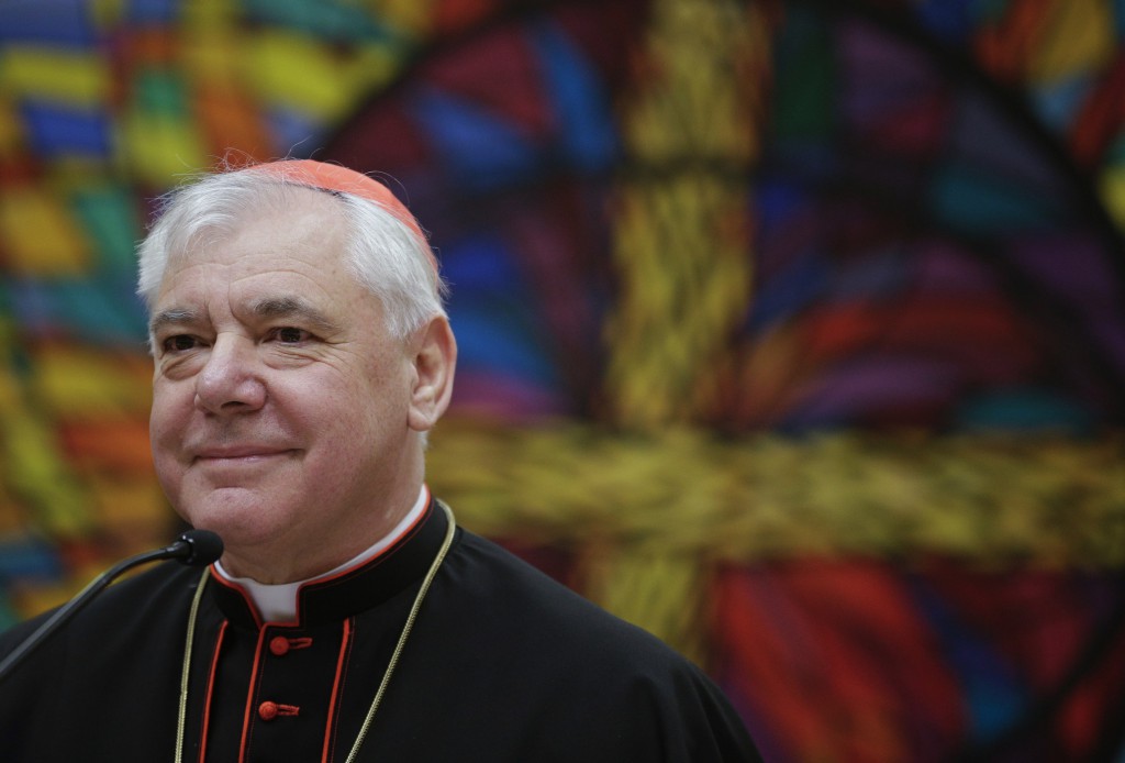 German Cardinal Gerhard Muller, doctrinal congregation prefect, smiles as he holds a news conference to unveil his book "Poor for the Poor: The Mission of the Church" in Rome Feb. 25. The book includes a preface written by Pope Francis and two chapters contributed by Dominican Father Gustavo Gutierrez, whose works once underwent a lengthy critical review by the doctrinal congregation. (CNS photo/Max Rossi, Reuters) 