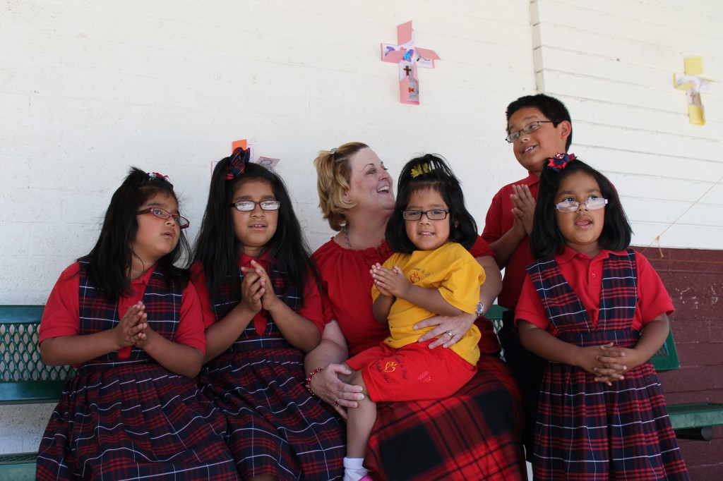 Tyra Sosnicki, a fourth-grade teacher at St. Vincent de Paul School, and her husband, Ted, adopted five siblings through Catholic Charities. From left: Rosa, 7; Yvonne, 8; Isabel, 3; Jonathan, 10; and Adriana, 5.