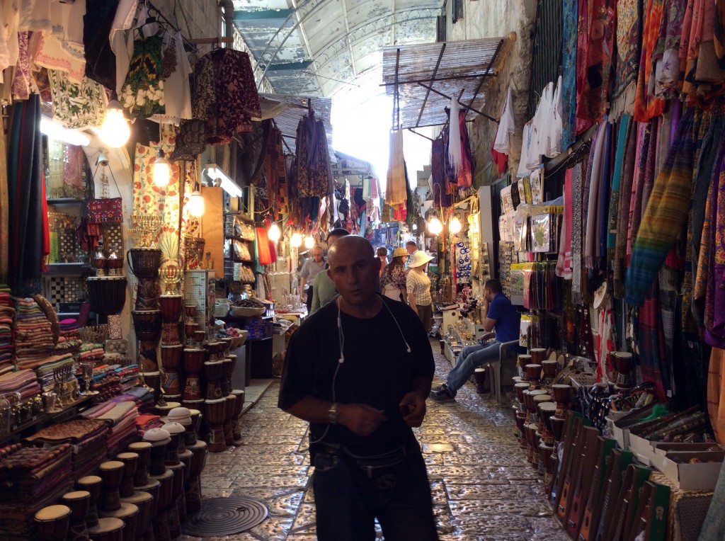 Our tour guide, Ali, shows us the Old City where Jewish, Christian and Muslim believers live and work together in peace. 