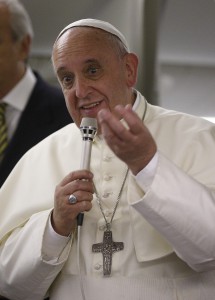 Pope Francis answers questions from journalists aboard the flight from Tel Aviv to Rome May 26.  (CNS photo/Paul Haring) 