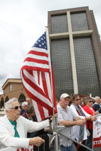 Participants pray during a rosary rally for religious freedom at St. Bernard Church in Levittown, N.Y., May 24. Archbishop William E. Lori of Baltimore will open the 2014 Fortnight for Freedom sponsored by the U.S. bishops with Mass June 21 at the Basilica of the National Shrine of the Assumption of the Blessed Virgin Mary in Baltimore. (CNS photo/Gregory A. Shemitz, Long Island Catholic)