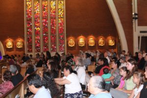 The faithful gathered to pray at Ss. Simon and Jude  Cathedral in the wake of the attack on the two priests. 