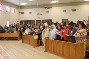 Bishop Eduardo A. Nevares blesses Agua Viva students during a special graduation Mass May 31 at Sacred Heart Parish in Phoenix (Ambria Hammel/CATHOLIC SUN)