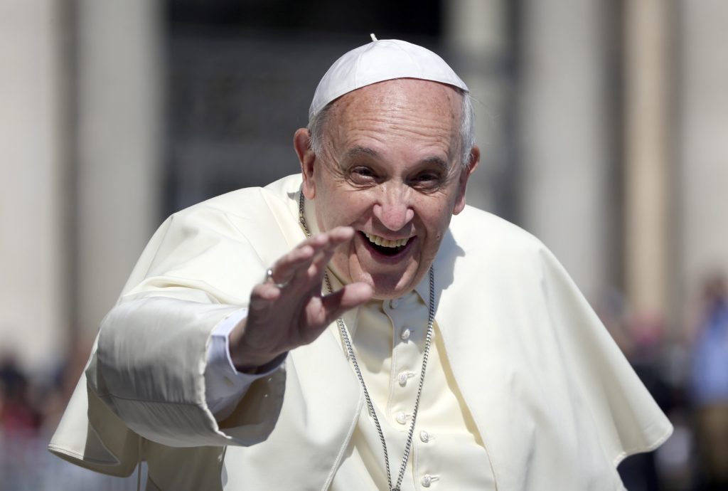 Pope Francis waves as he arrives to lead his weekly general audience in St. Peter's Square at the Vatican June 4. (CNS photo/Alessandro Bianchi, Reuters)