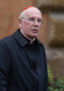 Cardinal Sean Brady of Armagh, Northern Ireland, arrives for the afternoon session of the general congregation meeting in the synod hall at the Vatican March 7. (CNS photo/Paul Haring) 