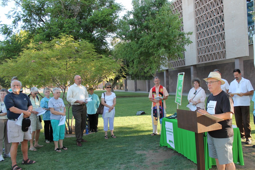 Dan Peitzmeyer, of the president of Arizona Death Penalty Alternatives, addresses a group gathered at the state capitol to protest the execution of convicted double murderer Joseph Wood. 