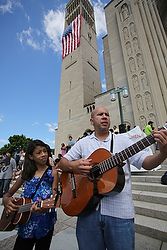 Isabella and Rene Pineda play music July 4 outside the Basilica of the National Shrine of the Immaculate Conception in Washington before attending Mass on the final day of the U.S. bishops' Fortnight for Freedom campaign. (CNS photo/Bob Roller) 