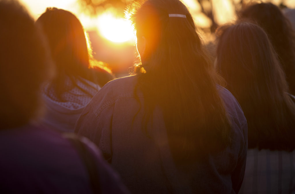 Members of the Tekakwitha Conference gather for a sunrise service July 24 during the organization's 75th annual meeting in Fargo, N.D. The Native American Catholic conference, held from July 23-27, drew 750 people from 35 states and Canada representing 1 35 indigenous tribes. (CNS photo/Nancy Wiechec)