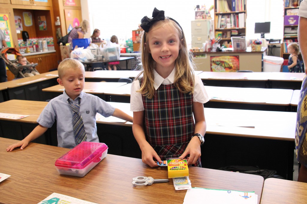 Margaret Maneely, a first-grader at Sacred Heart Catholic School and her brother, Porter Maneely, who attends the parish preschool, were on hand at an open house before the school year began. (Ambria Hammel/CATHOLIC SUN)