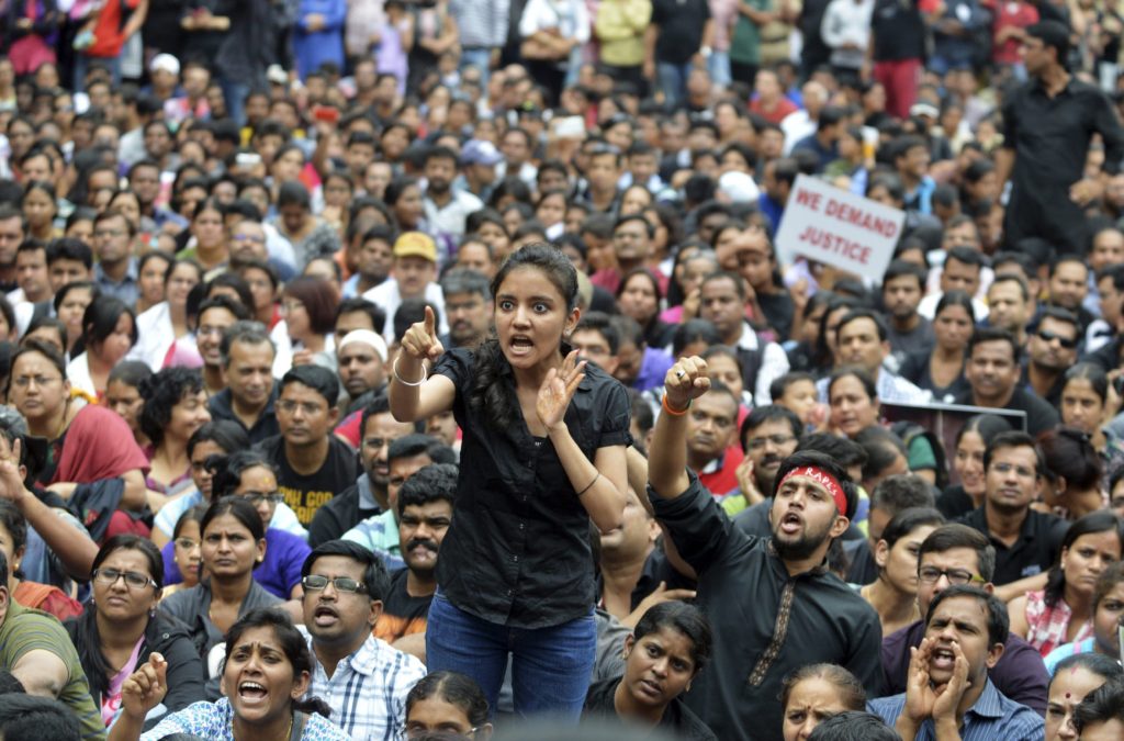 A demonstrator shouts slogans during a rape protest in Bangalore, India, July 19. A study by the New Delhi-based Commonwealth Human Rights Initiative discovered that two rapes have been reported every hour for the last 13 years, according to crime data collected by India's National Crime Records Bureau. (CNS photo/Stringer, Reuters)