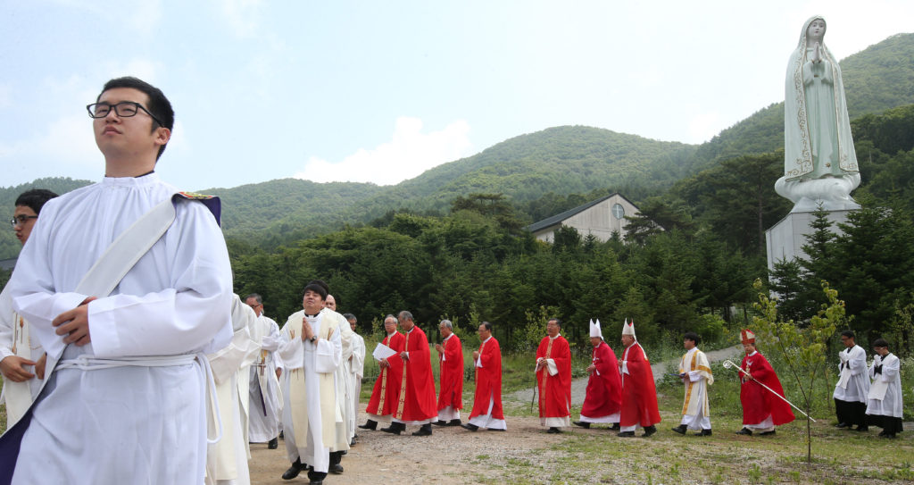 A Catholic ceremony takes place at the historic Chon Jin Am site in Gwangju, South Korea, June 24. The country is set to host about 30 countries for a five-day Asian Youth Day event that is focused on formation and spiritual life, particularly for youth leaders. The event will coincide with Pope Francis' visit to that country, where he is scheduled to beatify 124 Korean martyrs. (CNS photo/YONHAPNEWS via EPA)