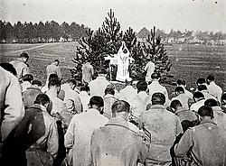 An archive picture shows a priest celebrating Mass for French soldiers on the Champagne front in eastern France in 1915. A viscount in the Armored Cavalry Branch of the French army left behind a collection of hundreds of glass plates taken during World War I that have never before been published. The images, by an unknown photographer, show the daily life of soldiers in the trenches, destruction of towns and military leaders. The year 2014 marks the 100th anniversary of the start of WWI. (CNS photo/courtesy of the Collection Odette Carrez via Reuters)