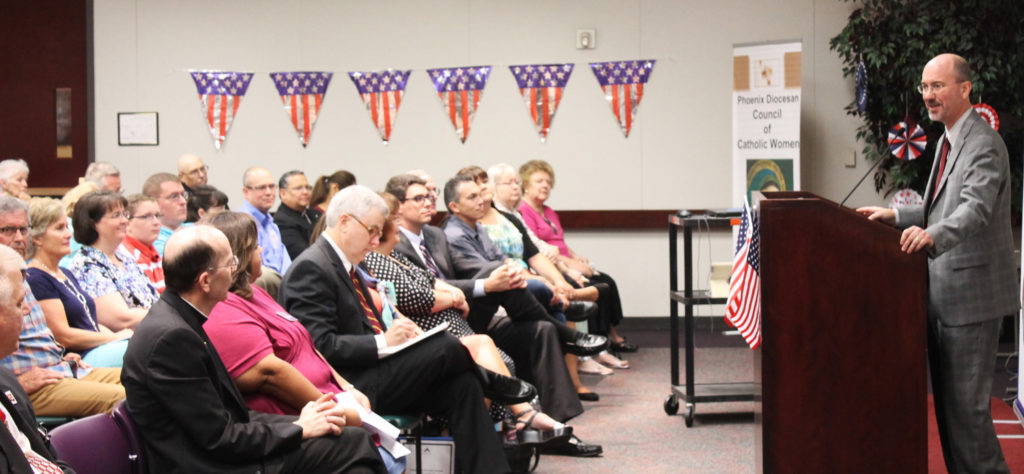 Ron Johnson, executive director of the Arizona Catholic Conference, encourages attendees Sept. 6 at the Diocesan Pastoral Center to be informed voters and to recall past successes such as the passage of the Marriage Protection Amendment in 2008. (Joyce Coronel/CATHOLIC SUN)