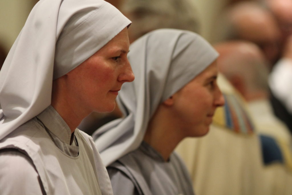 Sisters of the Most Holy Trinity attend the 2013 Christ Mass at Ss. Simon and Jude Cathedral. (Catholic Sun file photo)