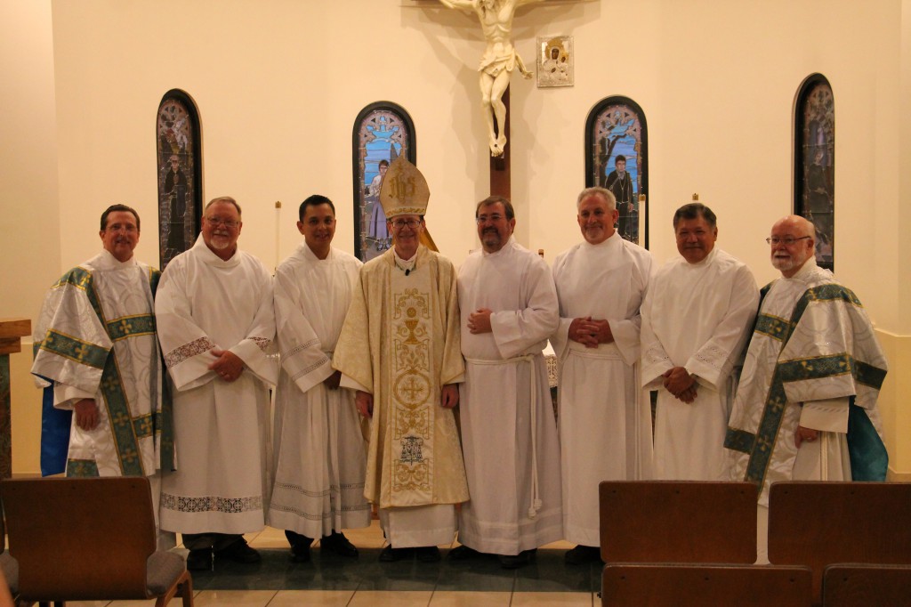 Bishop Thomas J. Olmsted instituted five men to the ministry of lector Sept. 12. The men continue to discern and train for the diaconate. (Ambria Hammel/CATHOLIC SUN)