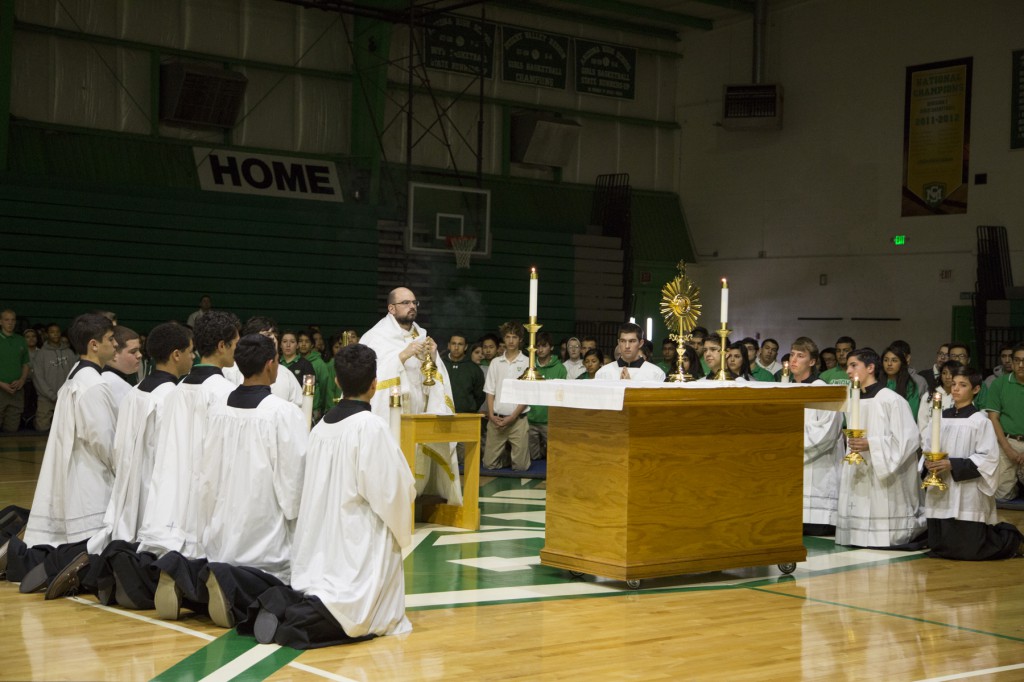 St. Mary's High School students have regular faith formation opportunities through academics, Mass and other prayer times including an annual eucharistic procession and adoration. (courtesy photo)
