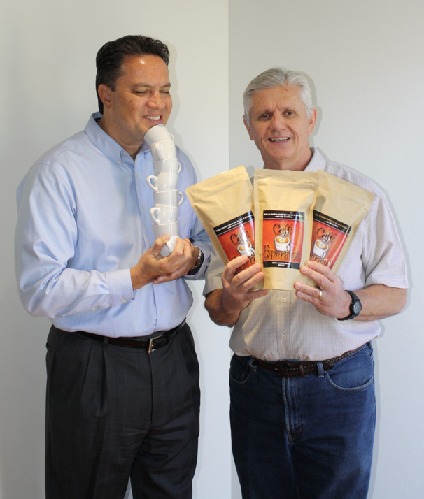Steve Capobres of Catholic Charities and The Refuge and Rodo Sofranac of Café Esperanza show off their locally roasted coffee in a file photo. (courtesy photo) 