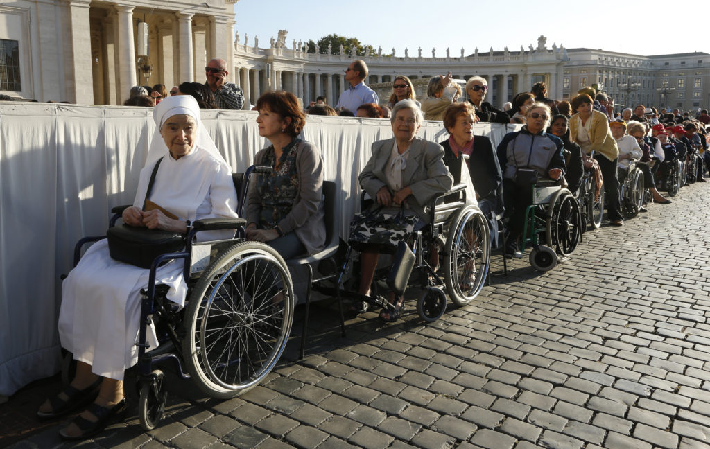 Elderly people, including religious sisters, wait for the start of Pope Francis' encounter with the elderly in St. Peter's Square at the Vatican Sept. 28. (CNS photo/Paul Haring)