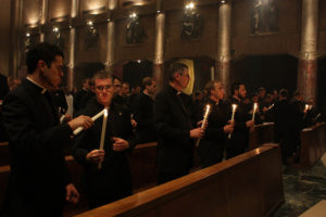 Fernando Camou, left, joined fellow ordinands during an Oct. 1 vigil on the eve of his ordination to the transitional diaconate. (Dan Hart/Pontifical North American College)