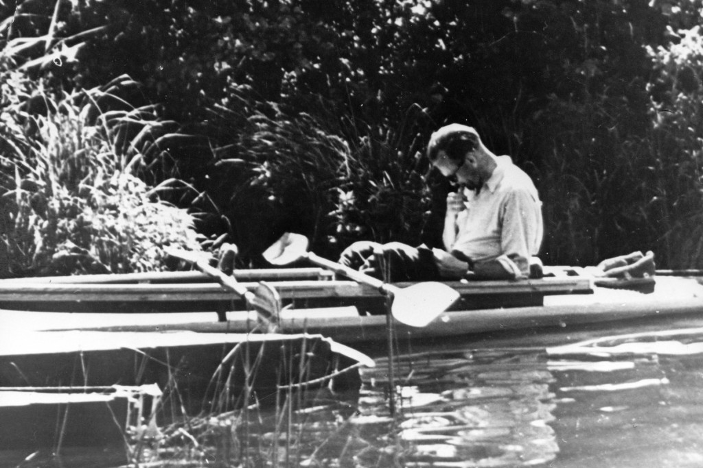 Father Karol Wojtyla, the future Pope John Paul II, is pictured reading in a kayak in this photo dated 1955. Less than six months after St. John Paul II was canonized, questions are being raised about a book of lectures he penned on social ethics as a young priest in his Polish homeland. (CNS photo)