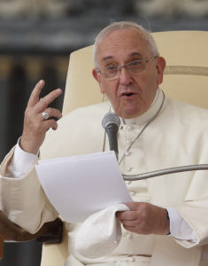 Pope Francis speaks during his general audience in St. Peter's Square at the Vatican Oct. 15. (CNS photo/Paul Haring)