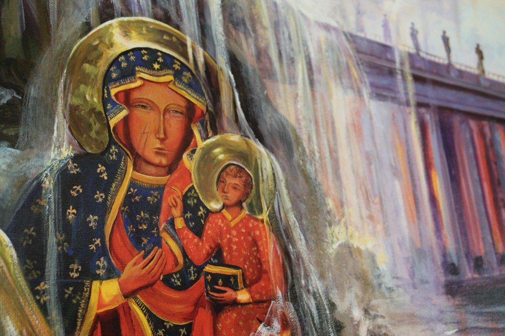 An image of Our Lady of Czestochowa is part of a collage painting that  highlights the life and influences of st. John Paul II. It hangs inside the Diocesan Pastoral Center. A standalone painting of the Polish Madonna ends its U.S. pilgrimage in the Diocese of Phoenix in the coming days. (Ambria Hammel/CATHOLIC SUN)