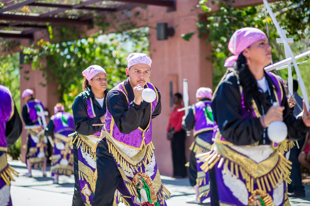 Matachine dancers beat drums and danced outside the Phoenix Convention Center Oct. 12. (Billy Hardiman/Catholic Sun)