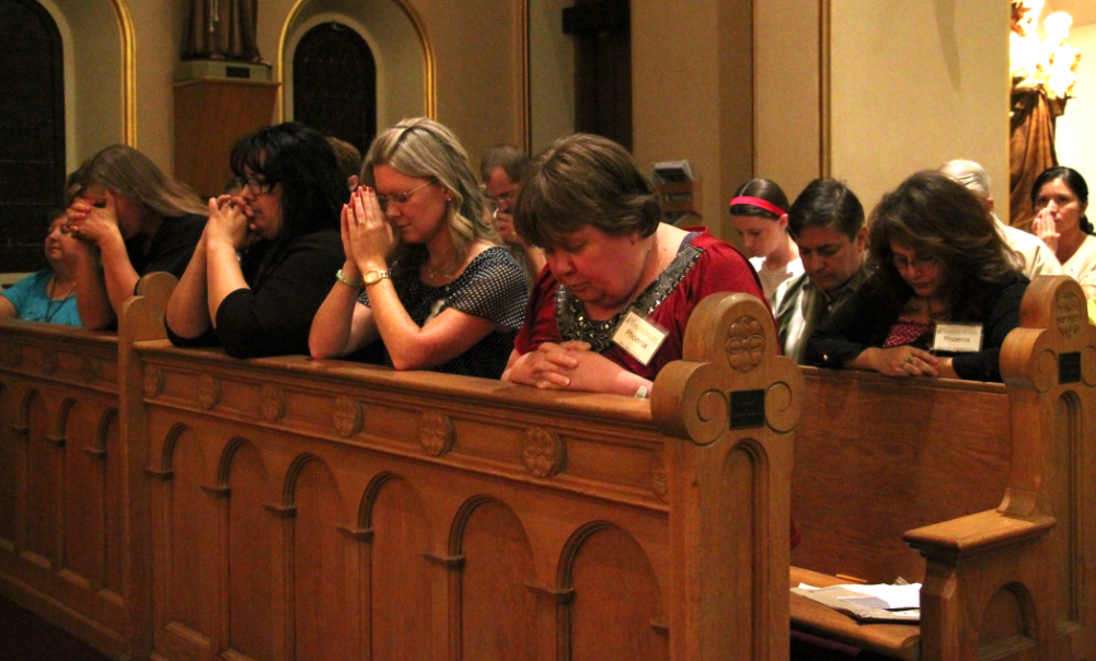 Leaders of 40 Days for Life vigil sites throughout the Valley pray during the Sept. 23 kickoff Mass at St. Mary's Basilica. (Ambria Hammel/CATHOLIC SUN)