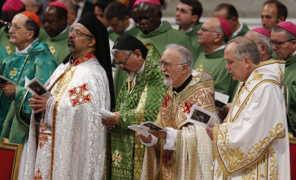 Byzantine Catholic Archbishop William C. Skurla of Pittsburgh, right, and other bishops attend a Mass celebrated by Pope Francis to open the extraordinary Synod of Bishops on the family in St. Peter's Basilica at the Vatican Oct. 5. (CNS photo/Paul Haring)  