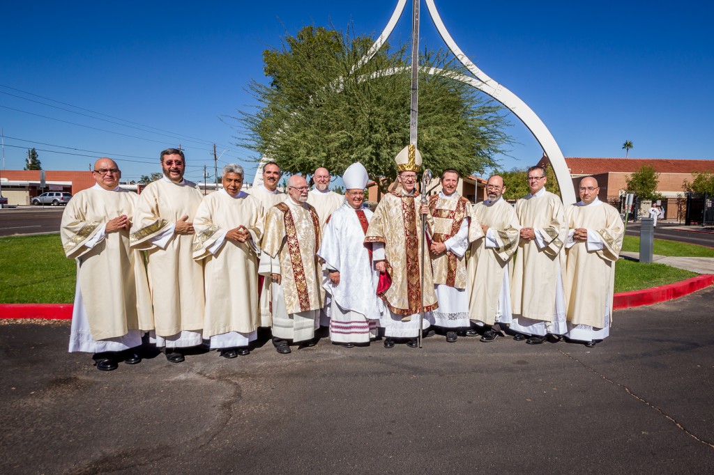 The Diocese of Phoenix's eight newest deacons pose for with Bishop Eduardo A. Nevares and Bishop Thomas J. Olmsted outside of Ss. SImon and Jude Cathedral Nov. 8 alongside deacons Jim Trant and Doug Bogart who saw them through formation (Billy Hardiman/CATHOLIC SUN)