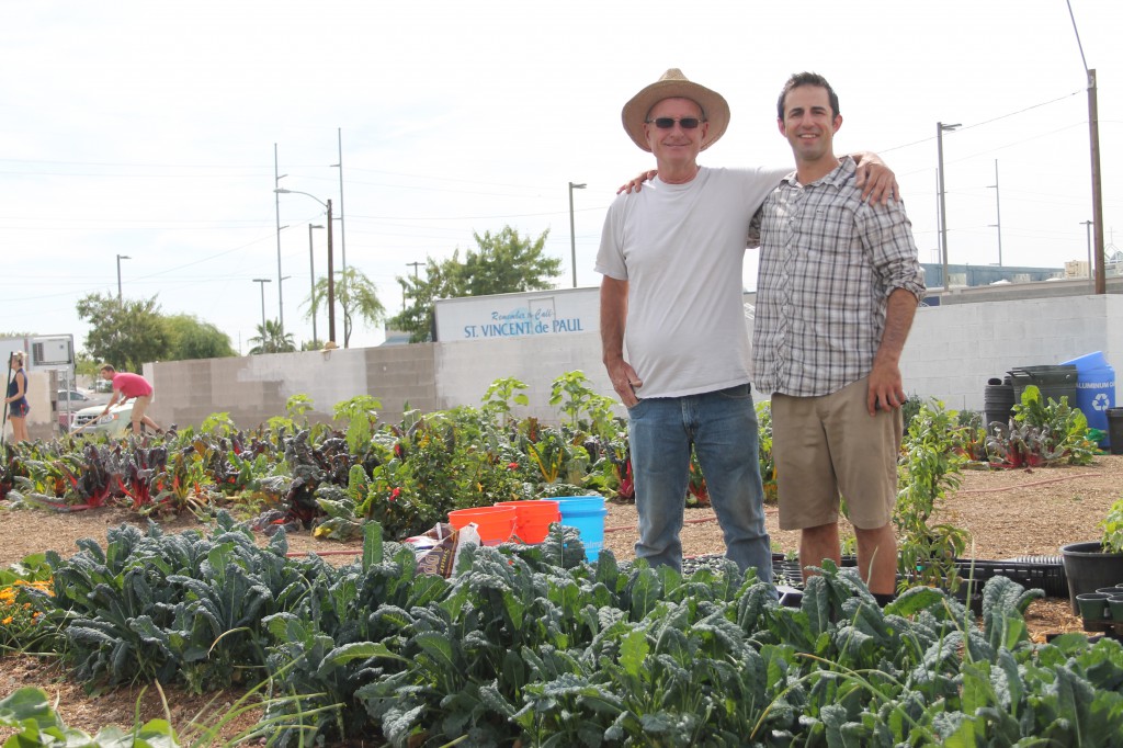 Jim Denis and Tony Ka are master gardeners who work alongside volunteers of all skill levels to maintain a pesticide-free garden at St. Vincent de Paul. Produce goes straight to the kitchen for dining room meals. (Ambria Hammel/CATHOLIC SUN)