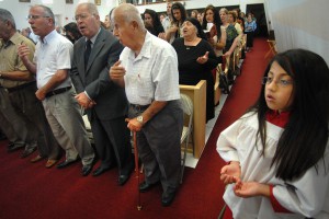 Chaldean Catholics attend Mass at St. Michael's Church in El Cajon, Calif., June 20. The church community is almost entirely Chaldean and a vast majority are refugees and immigrants from Iraq. (CNS photo/David Maung) (Dec. 14, 2010) 