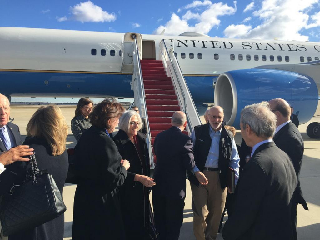 American aid worker Alan Gross, third from right, disembarks with his wife Judy, fourth from left, from a U.S. government plane as he arrives at Andrews Air Force Base in Maryland, outside Washington, after being released from a Cuban prison Dec. 17. The photo was tweeted by U.S. Sen. Jeff Flake, R-Ariz. (CNS photo/Reuters)