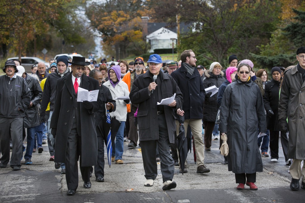 Parishioners from 10 churches in Ferguson, Mo., walk to City Hall Nov. 2. Former Ferguson mayor Brian Fletcher, a parishioner at Blessed Teresa of Calcutta, said his "heart is broken" over the destruction caused by rioters in the St. Louis suburb. (CNS photo/Lisa Johnston, St. Louis Review)  