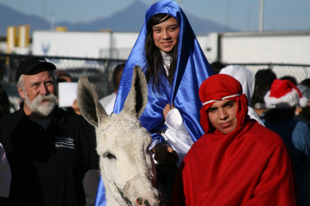 The Holy Family’s search for a safe place for Christ’s brith is commemorated each year in a nine-day custom known as Las Posadas. The tradition has its roots in Spain, but is also practiced in the United States. “Mary” and “Joseph” are seen here in this 2009 photo at the U.S.-Mexico border. (CATHOLIC SUN file photo)