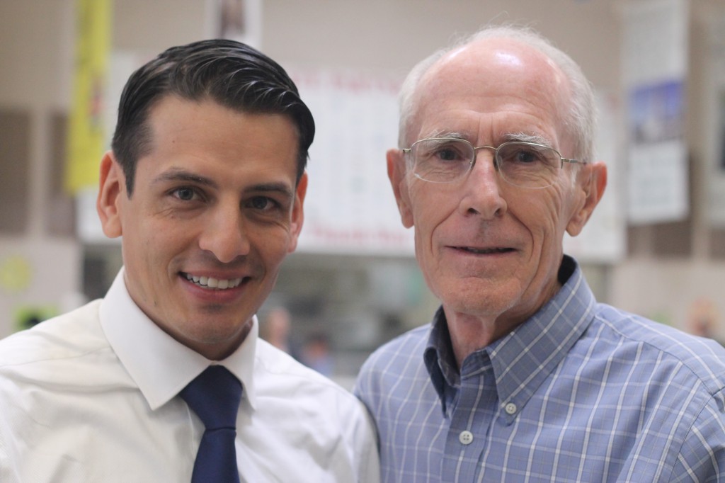 Marcelino Quiñonez poses with Terry Wilson, founder of a “One at a Time” financial aid program, Nov. 18. Quiñonez kept a vow to repay his generosity. (Ambria Hammel/CATHOLIC SUN)