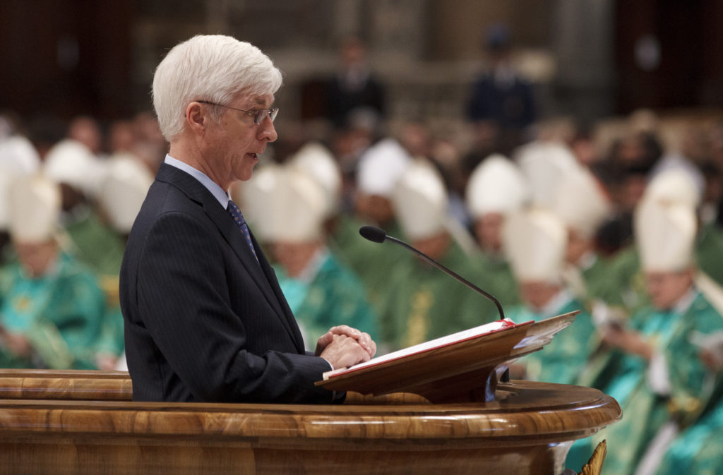 Ralph Martin, a professor at Sacred Heart Seminary in Detroit, reads the first reading as Pope Benedict XVI celebrates the closing Mass of the Synod of Bishops on the new evangelization in St. Peter's Basilica at the Vatican Oct. 28. (CNS photo/Paul Haring)  