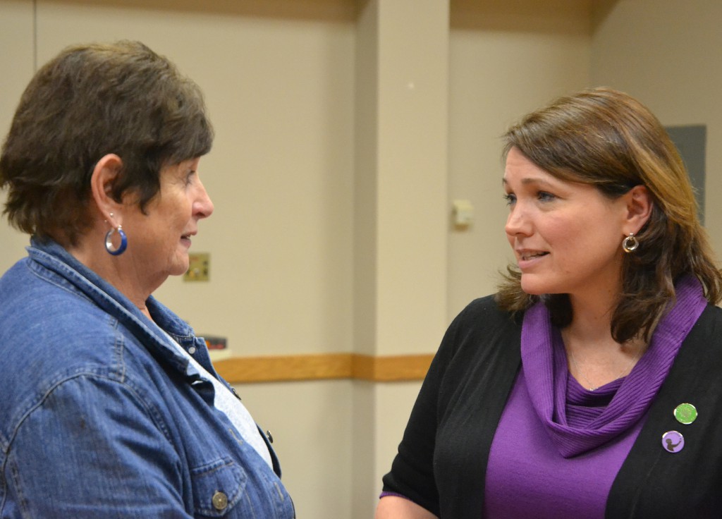 Mary Jo Schmitt of Dubuque, Iowa, speaks with Nicole Hockley of Newtown, Conn., after her presentation in late October at Loras College in Dubuque. Hockley lost her son in the Sandy Hook Elementary School shootings in Newtown in December 2012 and now works with Sandy Hook Promise, an organization dedicated to preventing gun violence. (CNS photo/Dan Russo, The Witness)  