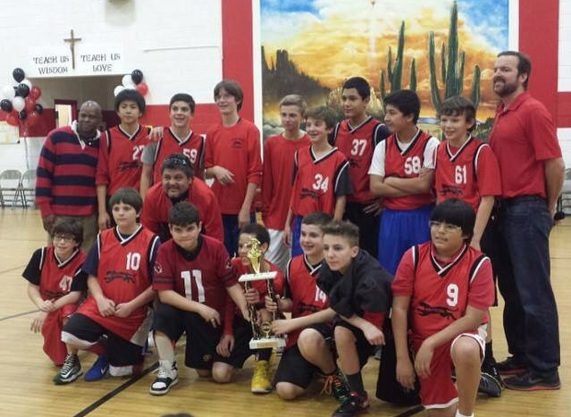 Sacred Heart's boys basketball team went undefeated all the way to the championship Dec. 11. (Photo from Facebook)