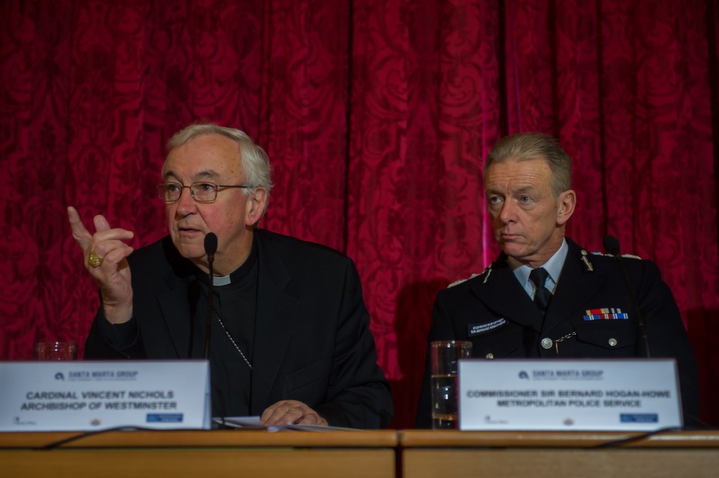 Cardinal Vincent Nichols of Westminster speaks during a human trafficking conference in London Dec. 6. The British governmentÕs Home Office has estimated that about 13,000 people in the United Kingdom have been trafficked into activities ranging from prostitution to domestic service and work on fishing boats. (CNS photo/Marcin Mazur, Catholic Communications Network)  