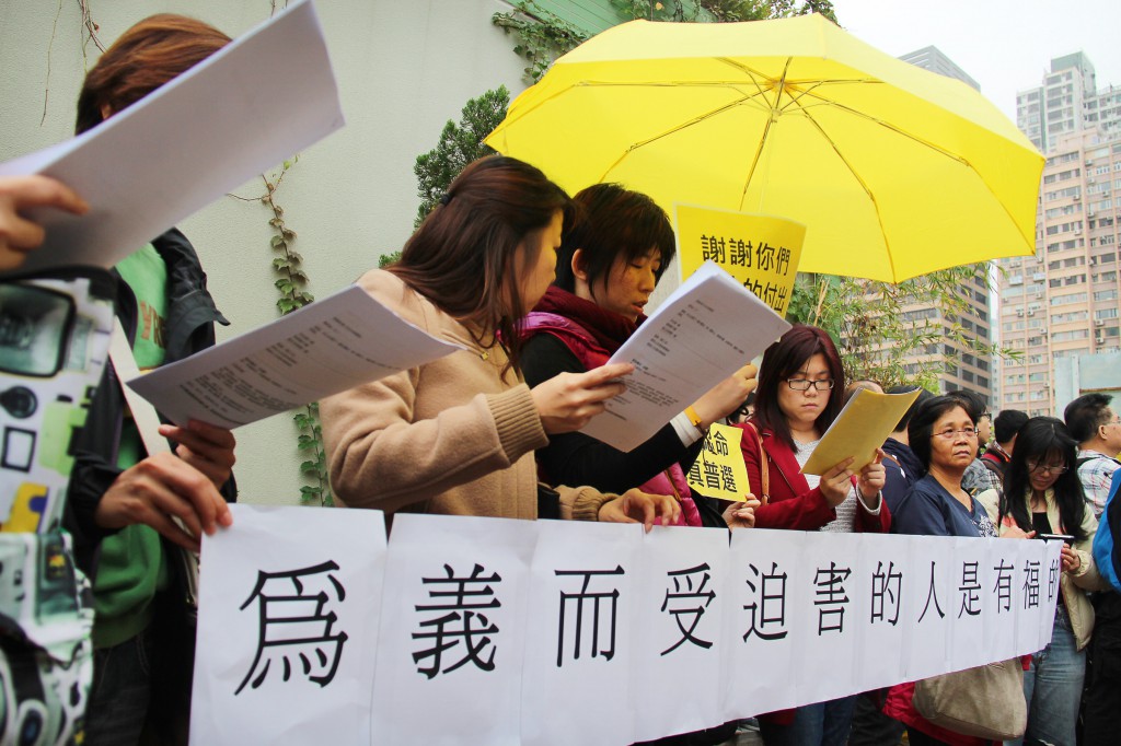 Hong Kong residents hold a banner that reads "Blessed are those who are persecuted for righteousnessÕ sake." The Occupy Central movement was initiated as an effort to force the Hong Kong and Chinese governments to allow true democracy in the city. (CNS photo/Francis Wong) 