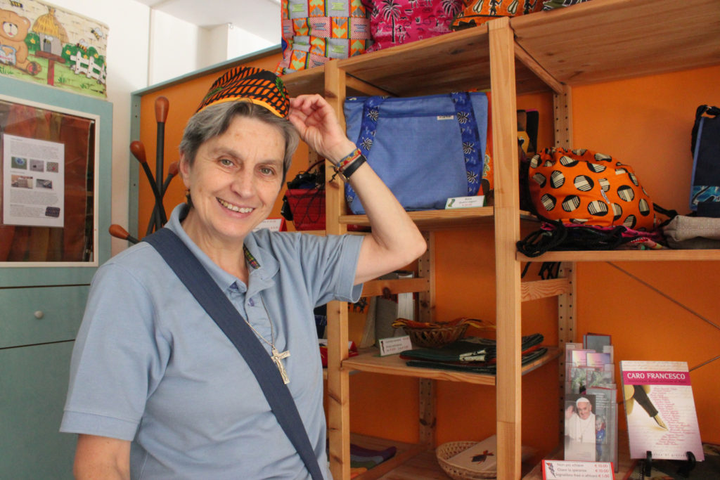 Ursuline Sister Rita Giaretta shows off the products at New Hope Cooperative in Caserta, Italy, in 2014. The cooperative offers women who have been rescued from sex traffickers a chance to earn a small salary and start a new life. (CNS photo/Megan Sweas)