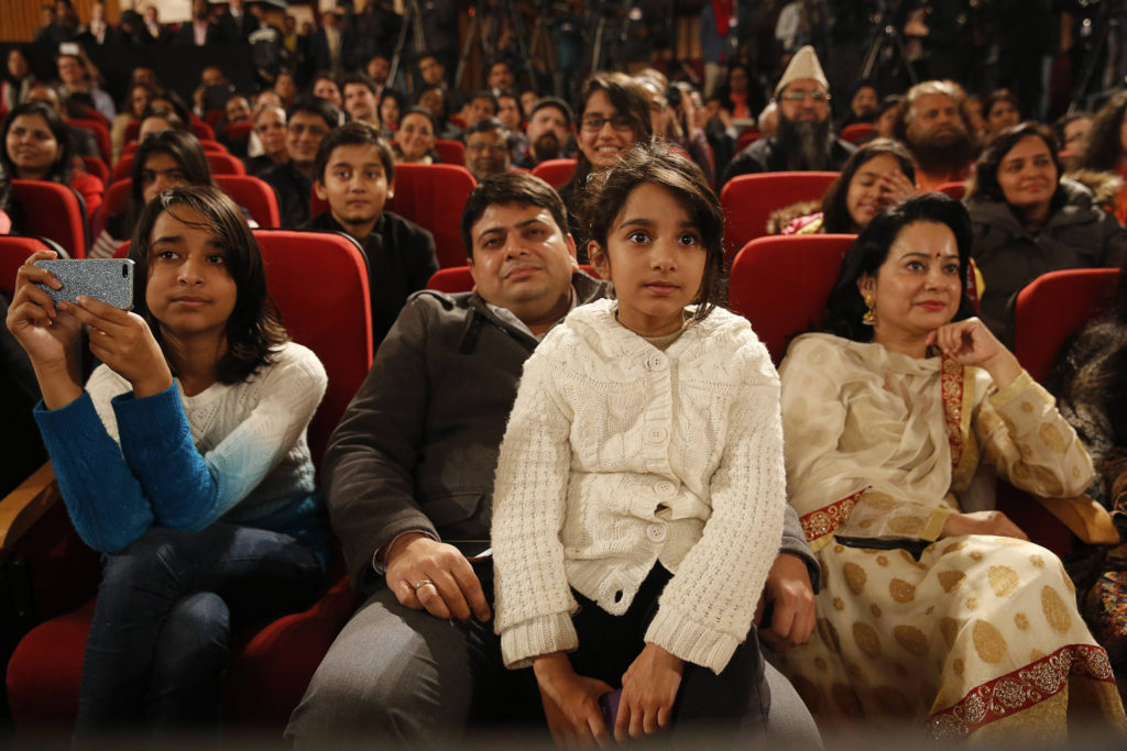 Attendees listen as U.S. President Barack Obama delivers a speech at Siri Fort Auditorium in New Delhi Jan. 27.  An Indian Catholic leader welcomed the parting message of Obama, who reiterated freedom of religion as a fundamental right. (CNS photo/Jim Bourg, Reuters)  