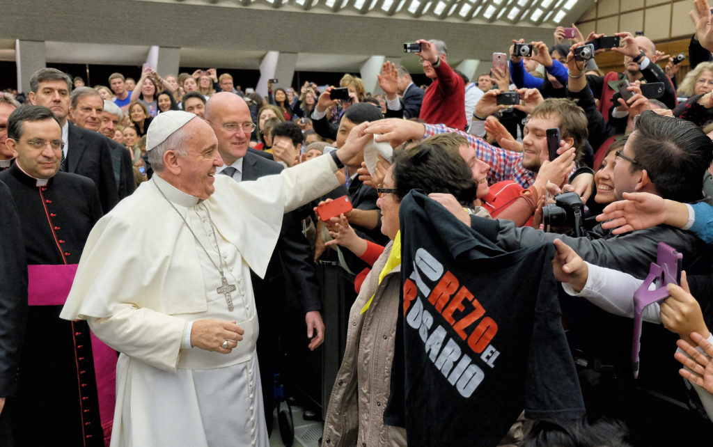 Andrew Meyer exchanges zuchettos with Pope Francis at a papal audience in the Paul VI Auditorium in Rome Jan. 21. (courtesy photo)