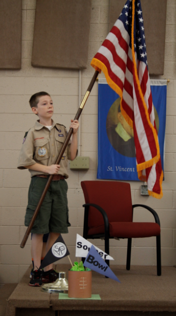 A Boy Scout prepares to post colors to kickoff the Souper Bowl of Caring effort in Arizona Jan. 14. (Ambria Hammel/CATHOLIC SUN)