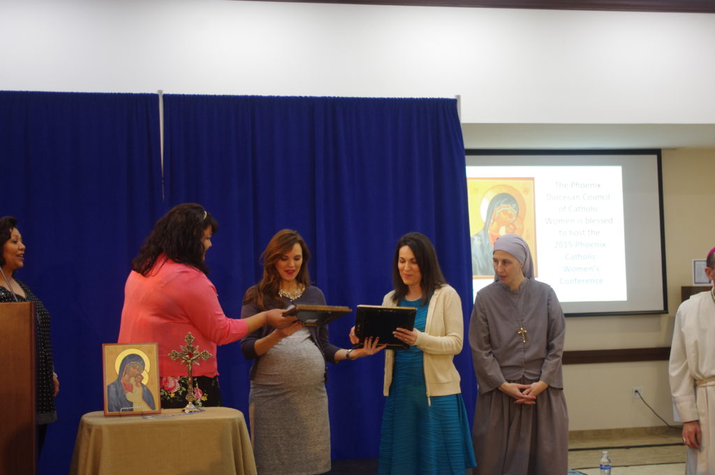Rhapsody Canepa, president of the Phoenix Diocesan Council of Catholic Women, presents icons of the Blessed Virgin Mary to Leah Darrow, Leila Miller and Sr. Alison Conemac, SOLT, speakers at the Fifth Annual Phoenix Catholic Women's Conference Feb. 21. (Joyce Coronel/CATHOLIC SUN)