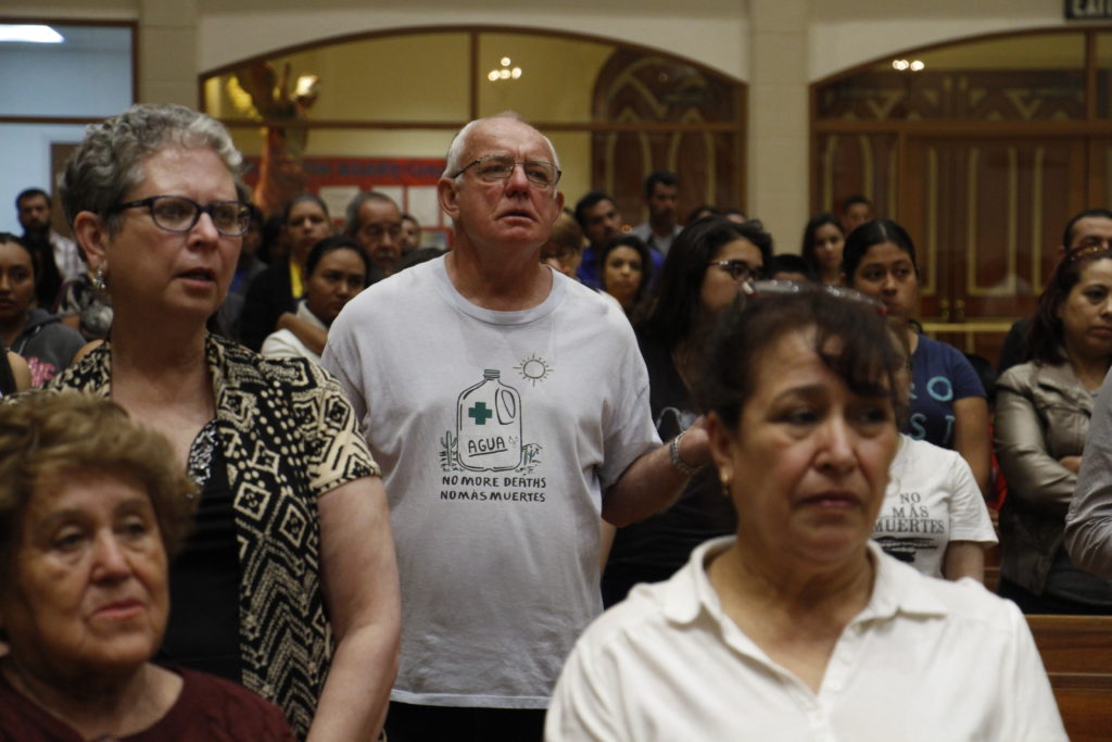 A Feb. 20 procession, Mass and panel discussion drew peaceful and prayerful attention to the challenges immigrants face in their homelands plus ideas on how to help. Each part of the Mass for Migrants event aimed to bring the issue of immigration to the personal level. (Ambria Hammel/CATHOLIC SUN)